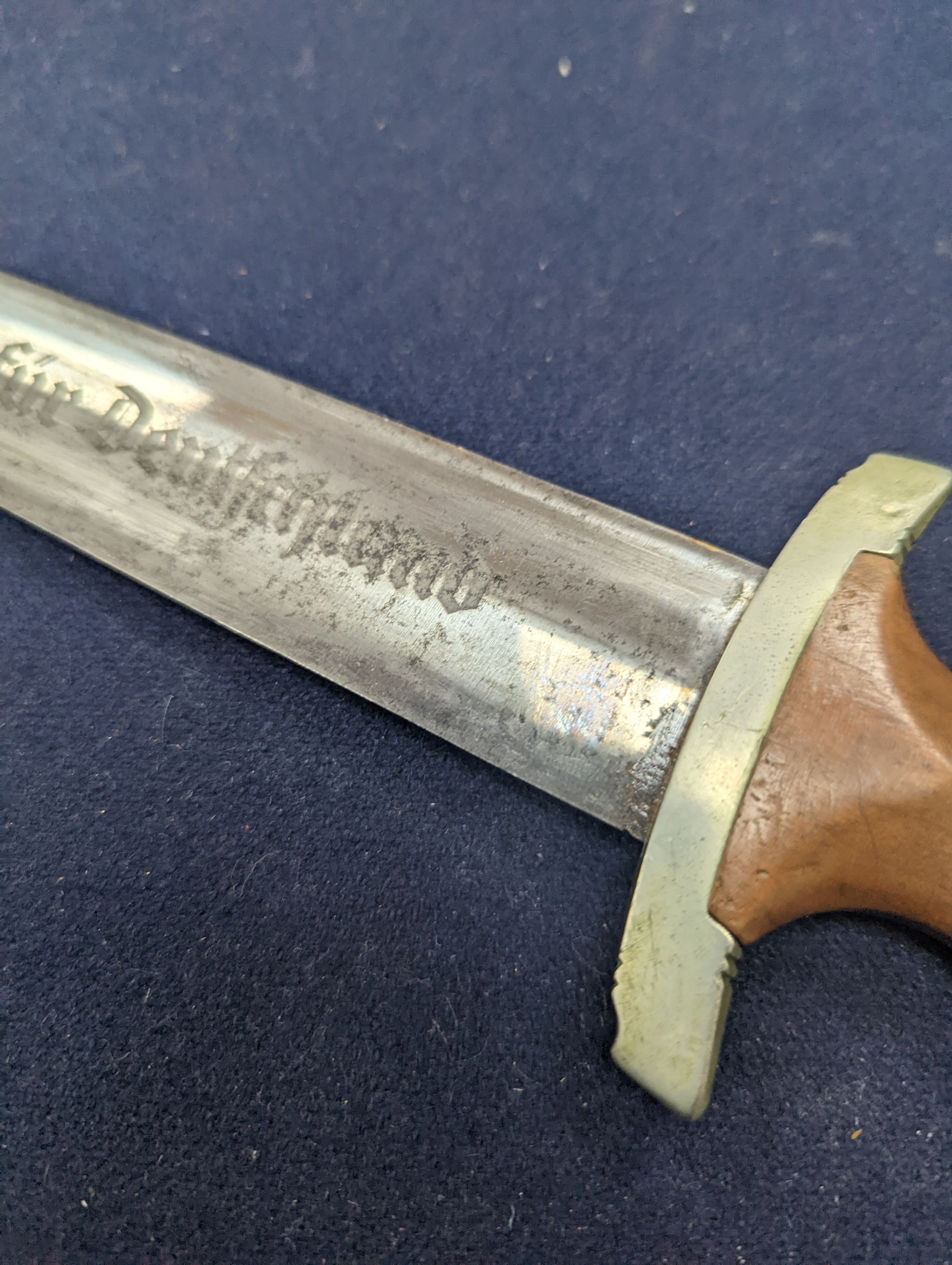 A Third Reich SA dagger within sheath, blade 22cm., and a bayonet within scabbard